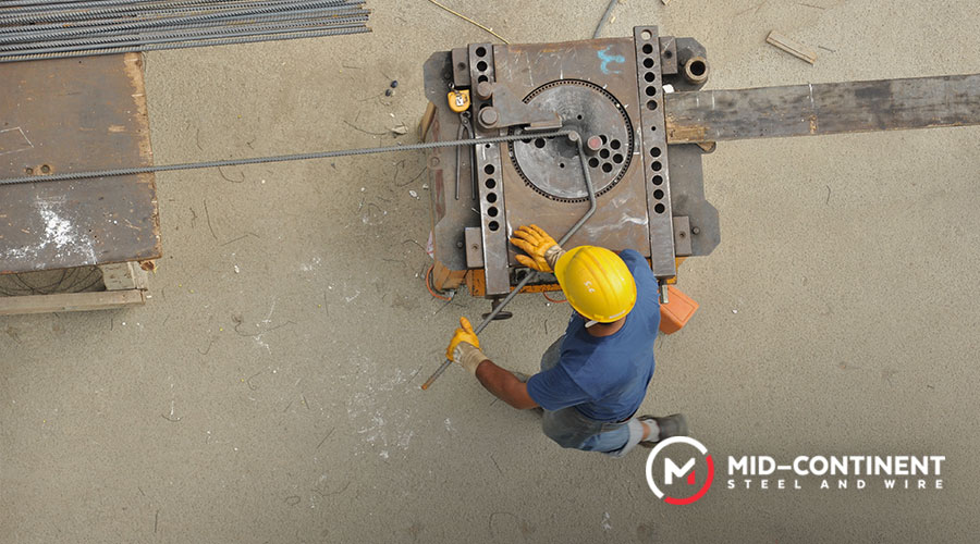 Long pieces of steel in the bending process