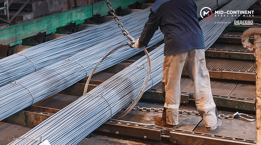 Bundles of heavy-duty industrial steel ready for transport.