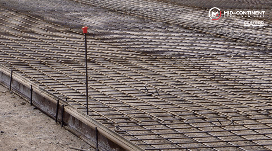 High-strength welded wire reinforcement grid prepared for concrete slab installation.